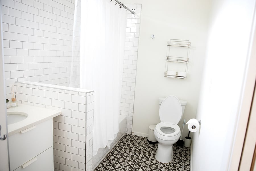 Full sized bathroom with a bathtub.