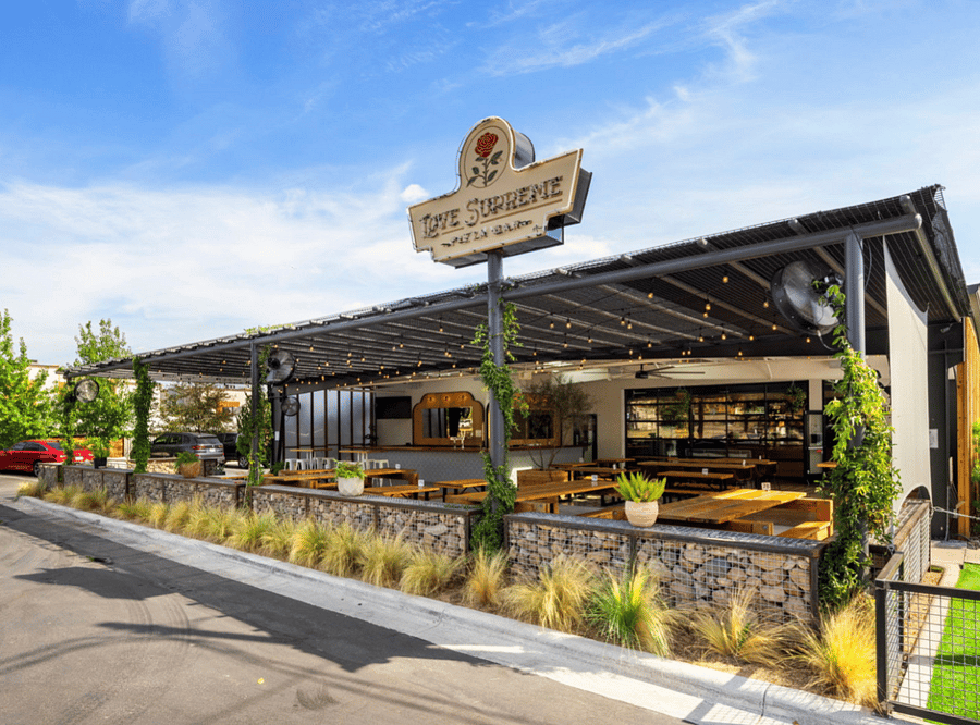 Love Supreme has amazing pizza and a fantastic patio. Just around the corner on Manor Rd.