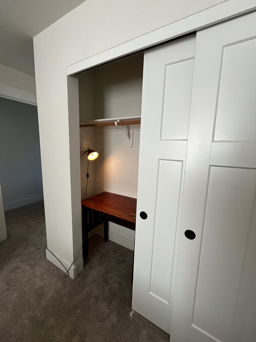 Large closet with small desk (optional).