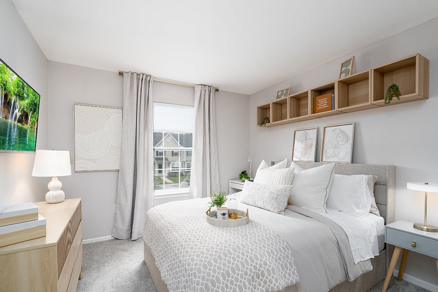 Bright and airy suite with soft neutral tones, premium bedding, and a dedicated workspace for added convenience. Designed for both comfort and functionality, perfect for extended stays with a clean, calming aesthetic.