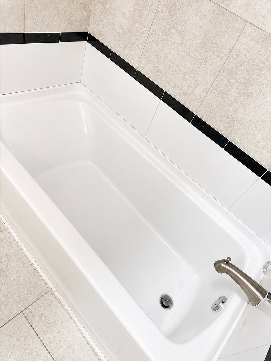 Spacious full bathroom with modern finishes.