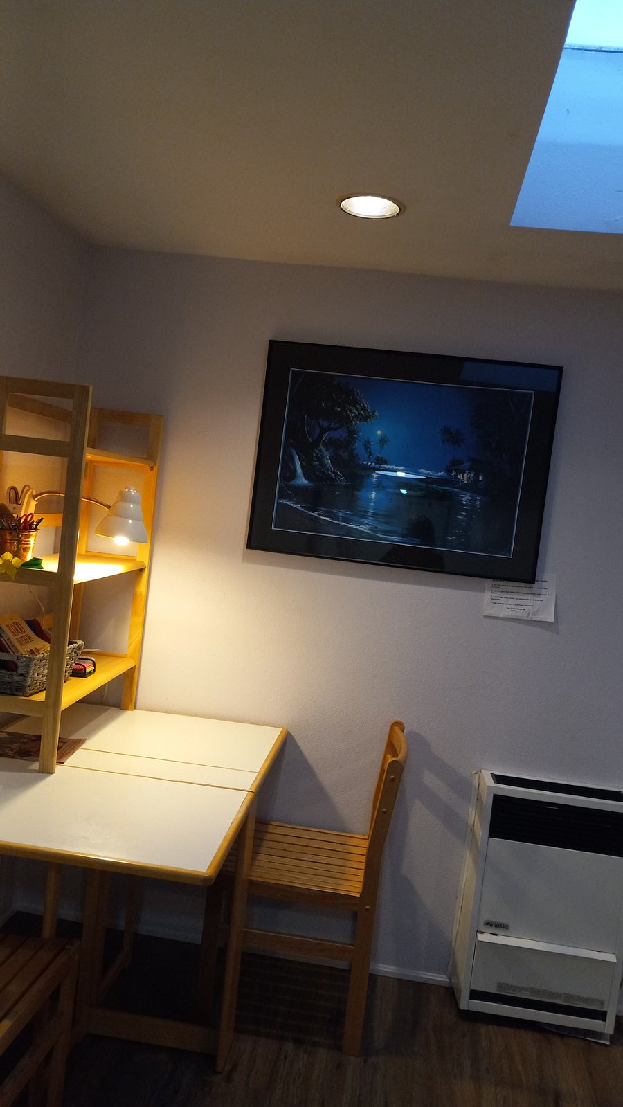 Folding table with (2) chairs for eating and computer desk work.