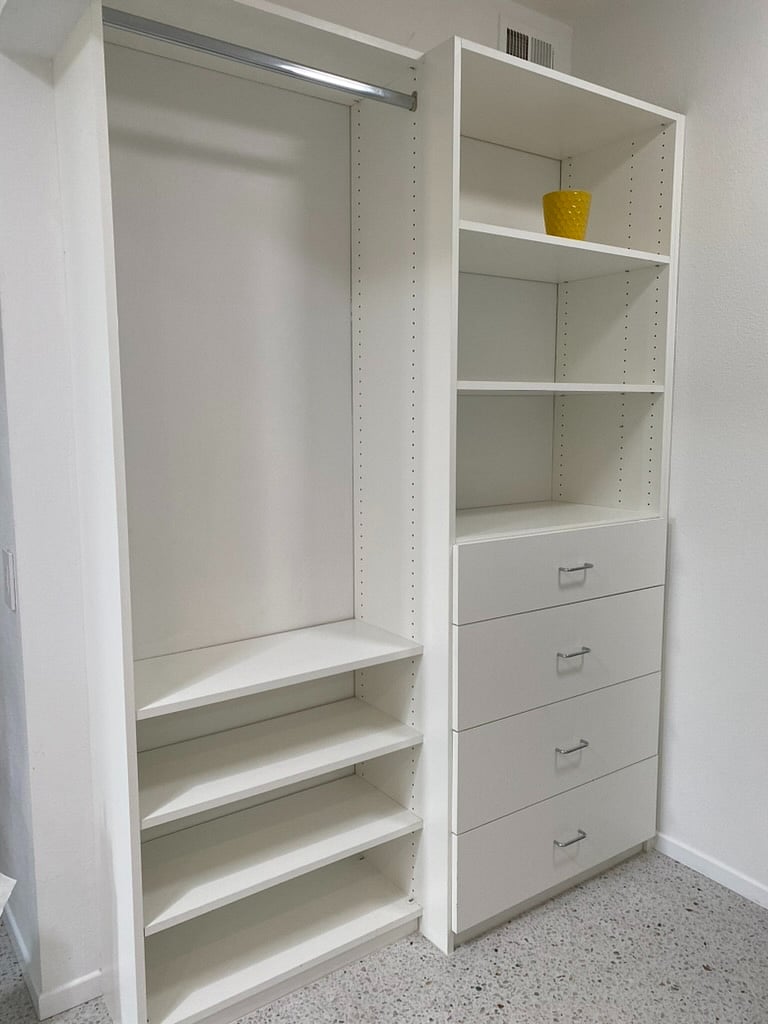 Primary ensuite closet with ample storage
