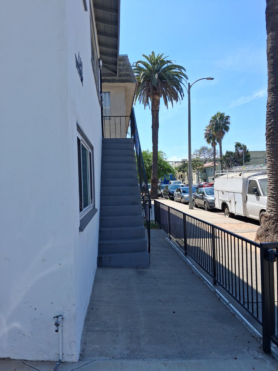 Bottom of stairs.