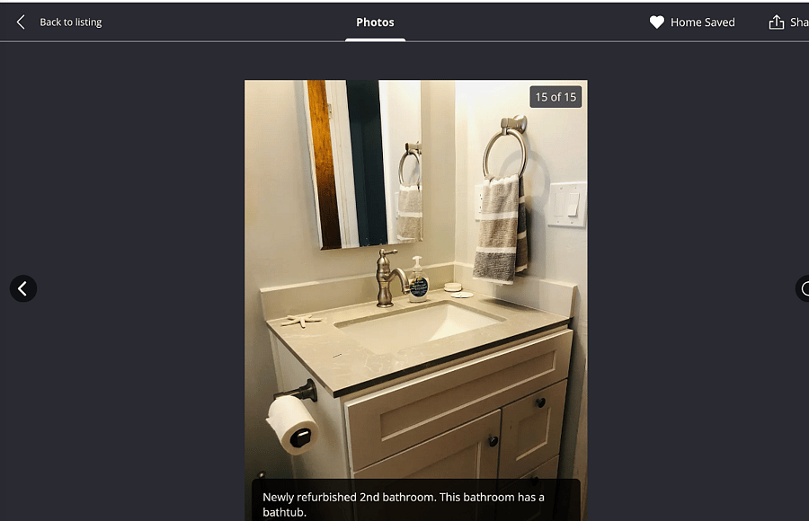 Beautifully updated second bathroom providing added convenience for family or guests.