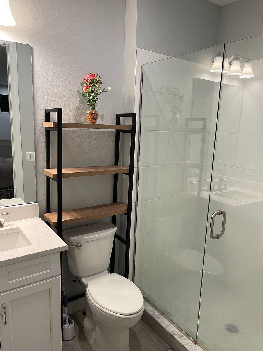 Spacious loft-style bedroom with a private bathroom