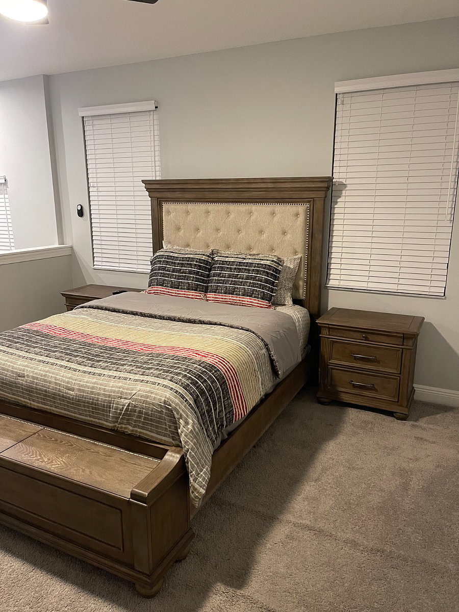 Spacious loft-style bedroom with a private bathroom