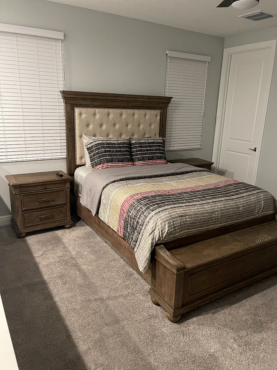 Spacious loft-style bedroom with a private bathroom