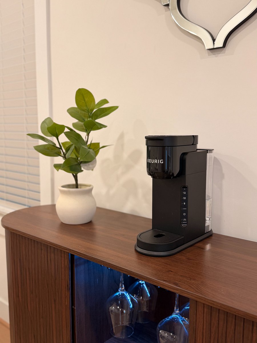 Bar cart with wine glasses and Keurig for fresh coffee