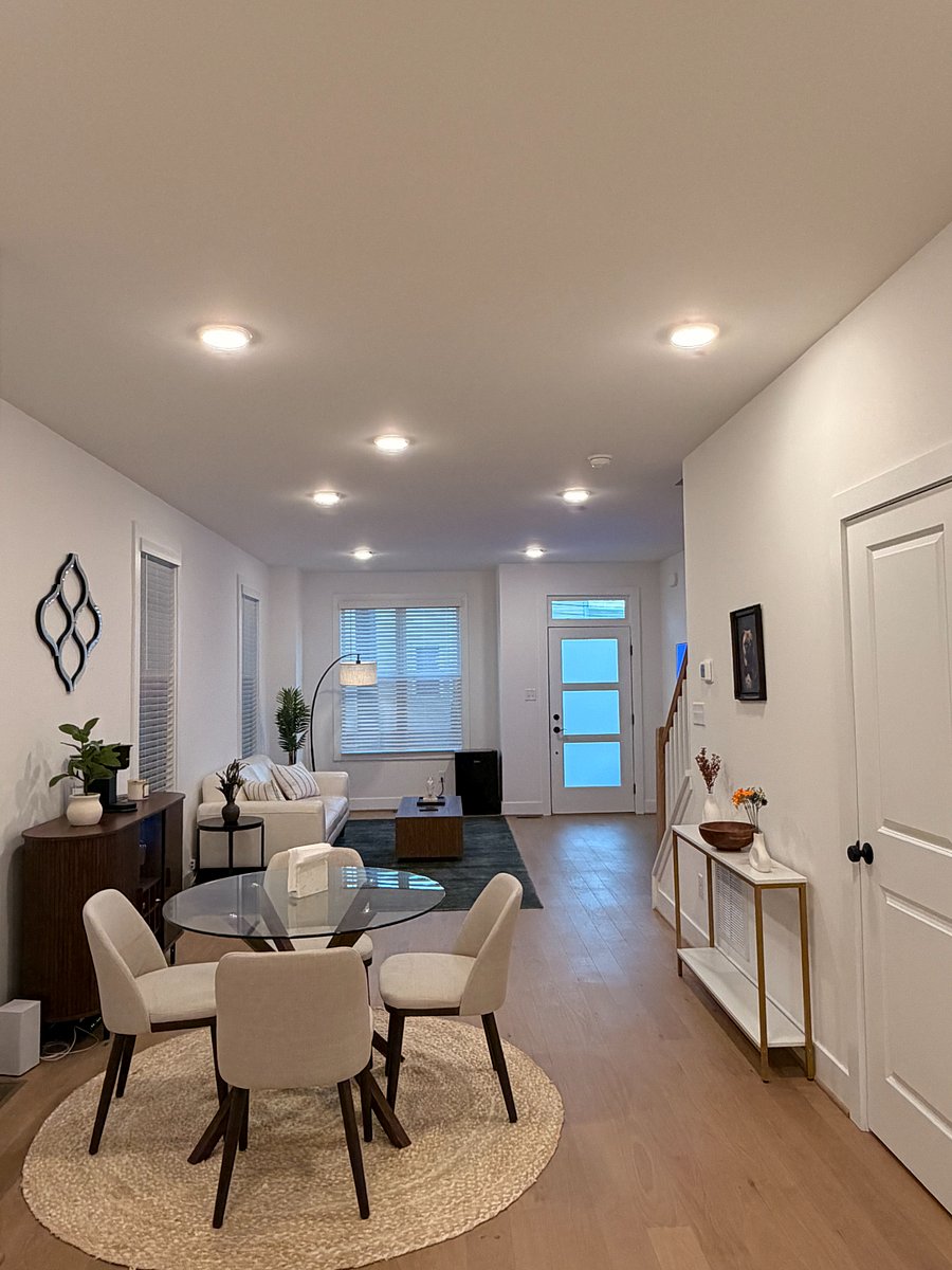 Living room with 50in TV and mini fridge