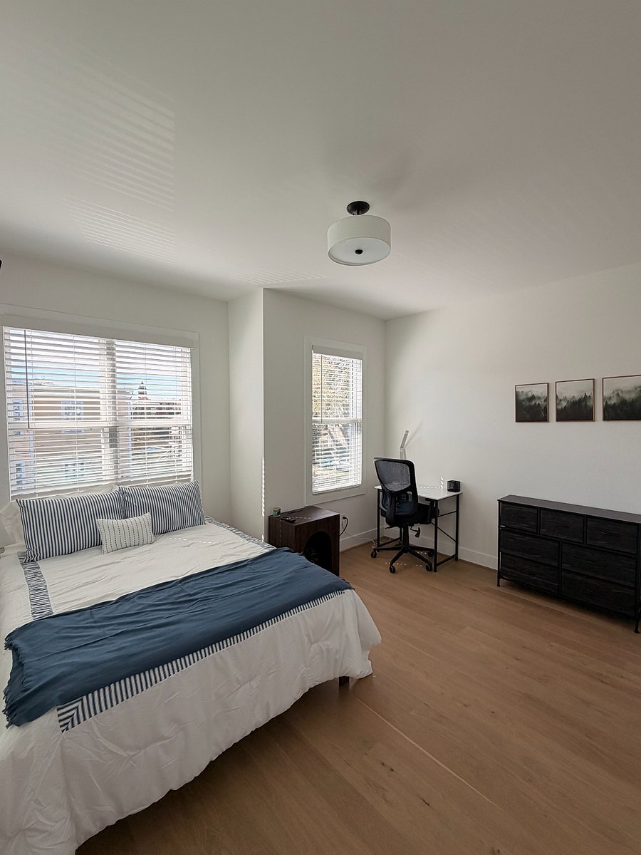 Room 1 - Available at $1,100/month
Includes NEW BLACK OUT CURTAINS, smart TV, bedside table, desk and chair, large closet, and dresser