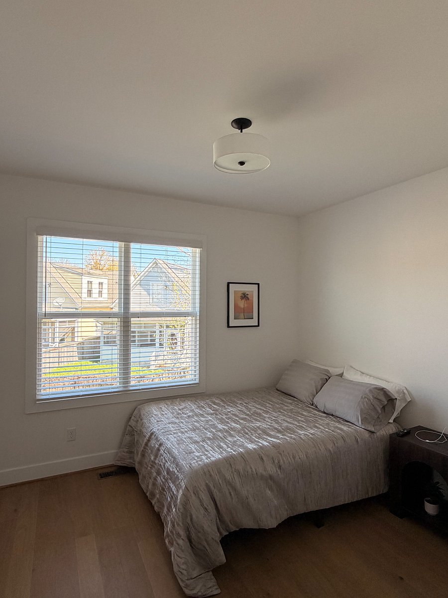 Room 2 - Available at $1,000/month
Includes NEW BLACK OUT CURTAINS, smart TV, bedside table, desk and chair, large closet, and dresser
