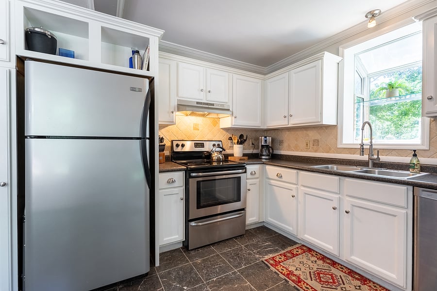 The refrigerator and stove and been replaced with brand new, upgraded appliances.