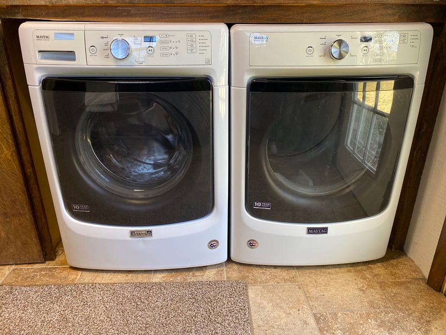 Commercial size washer and dryer in home.