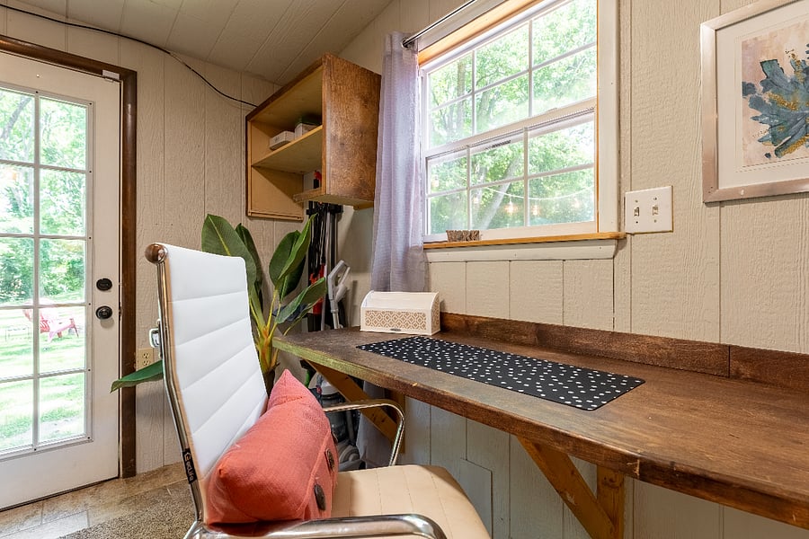 Laundry room doubles as an office.