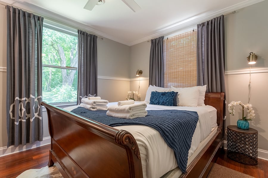 The primary features a queen bed.