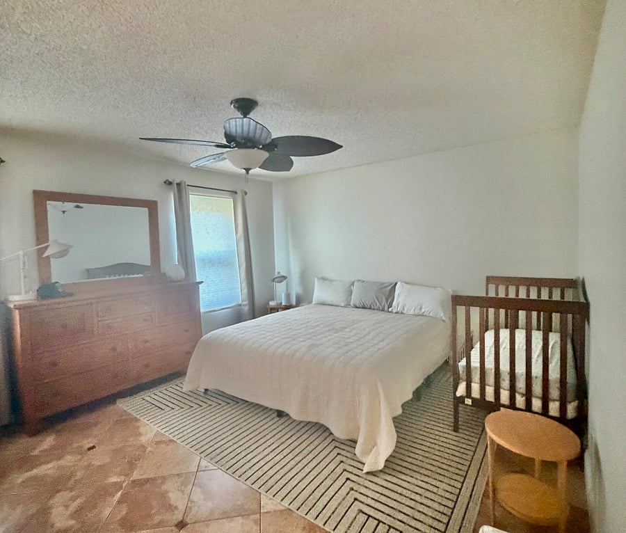 Master Bedroom has a king size bed. Crib is not included in the rental unless it is requested.
