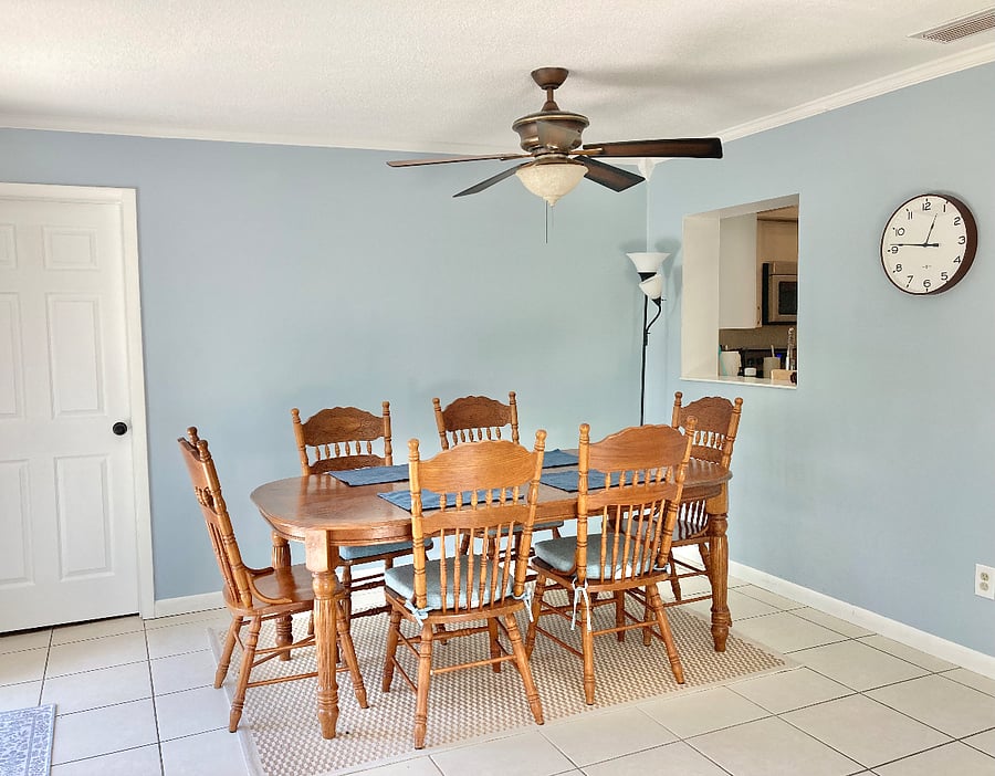 Dining room table for 6. The door to the left is the door to the 3rd bedroom.