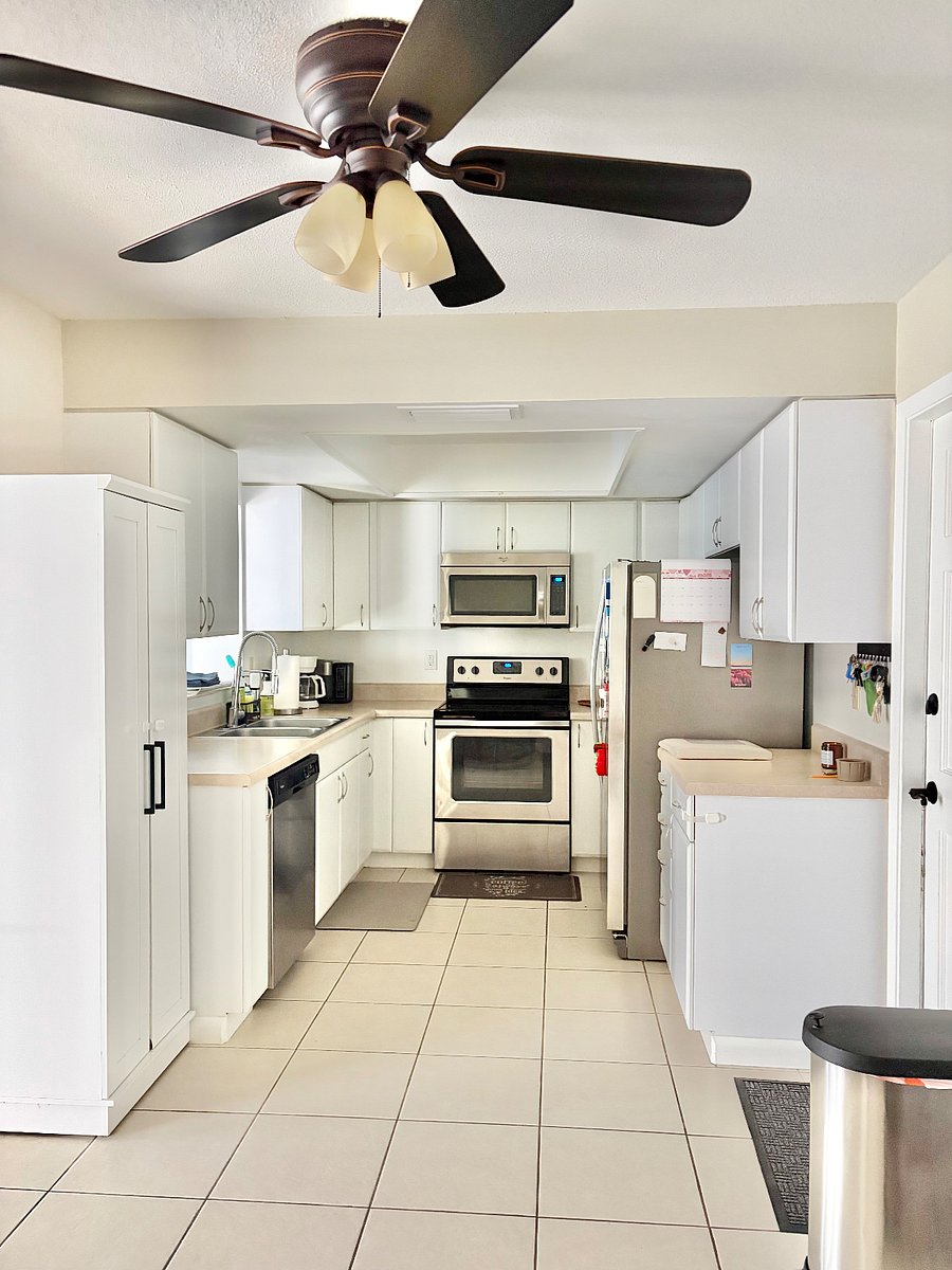The kitchen is fully stocked with all major kitchen appliances as well as a toaster, blender, air fryer, coffee maker and more.
