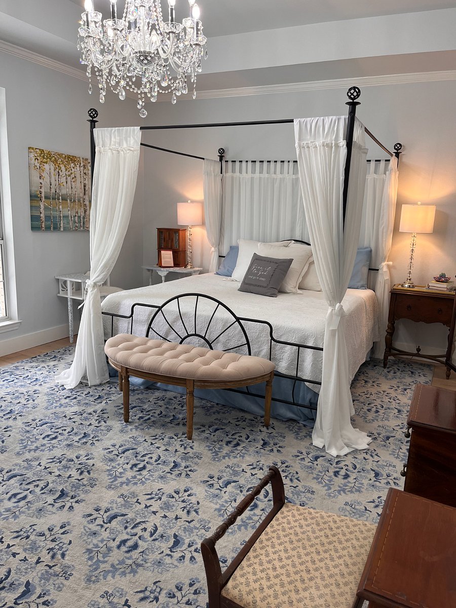 Elegant primary retreat with King bed, double vanity and dressing room.