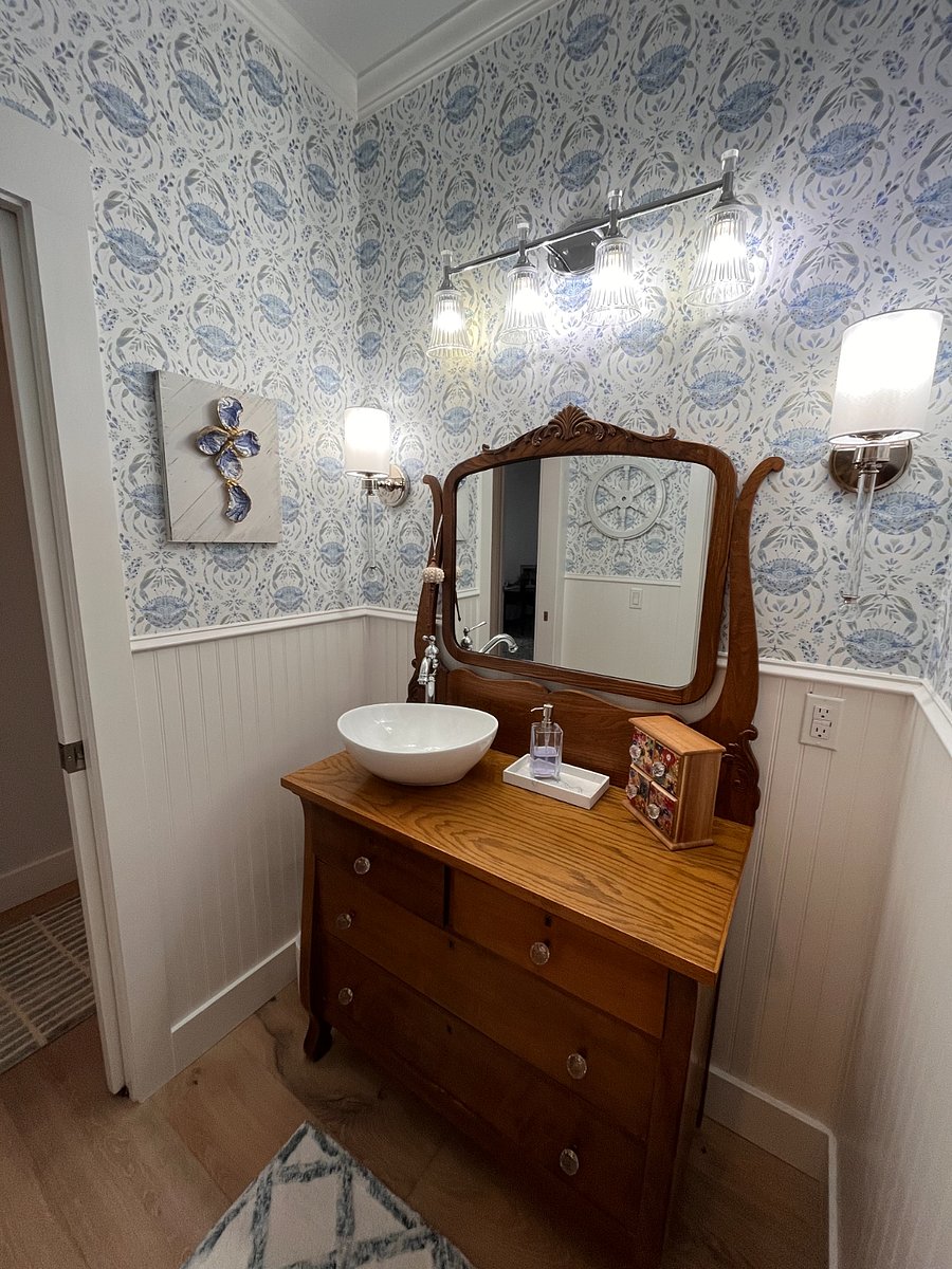Quaint secondary vanity area, separate shower and toilet.