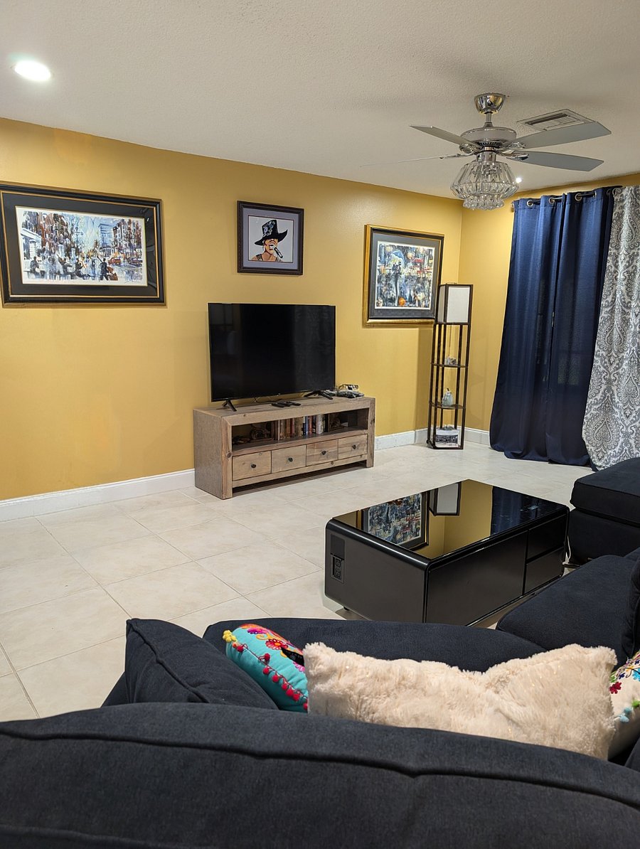 Smart TV and a collection of books.
