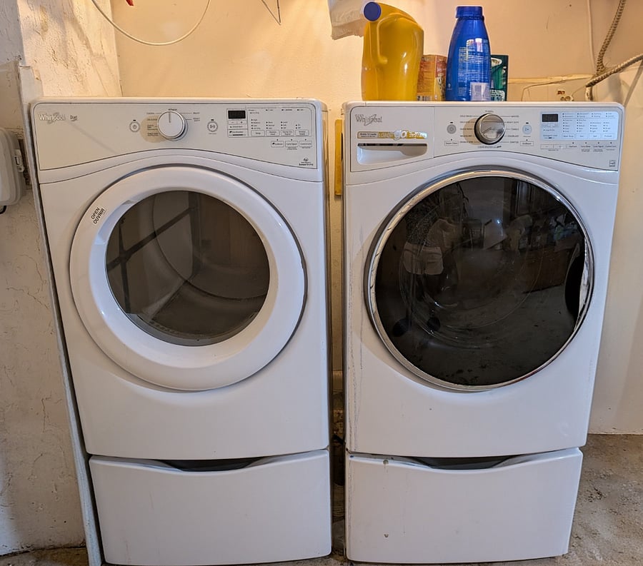 Full size washer and dryer in garage accessible from the kitchen.