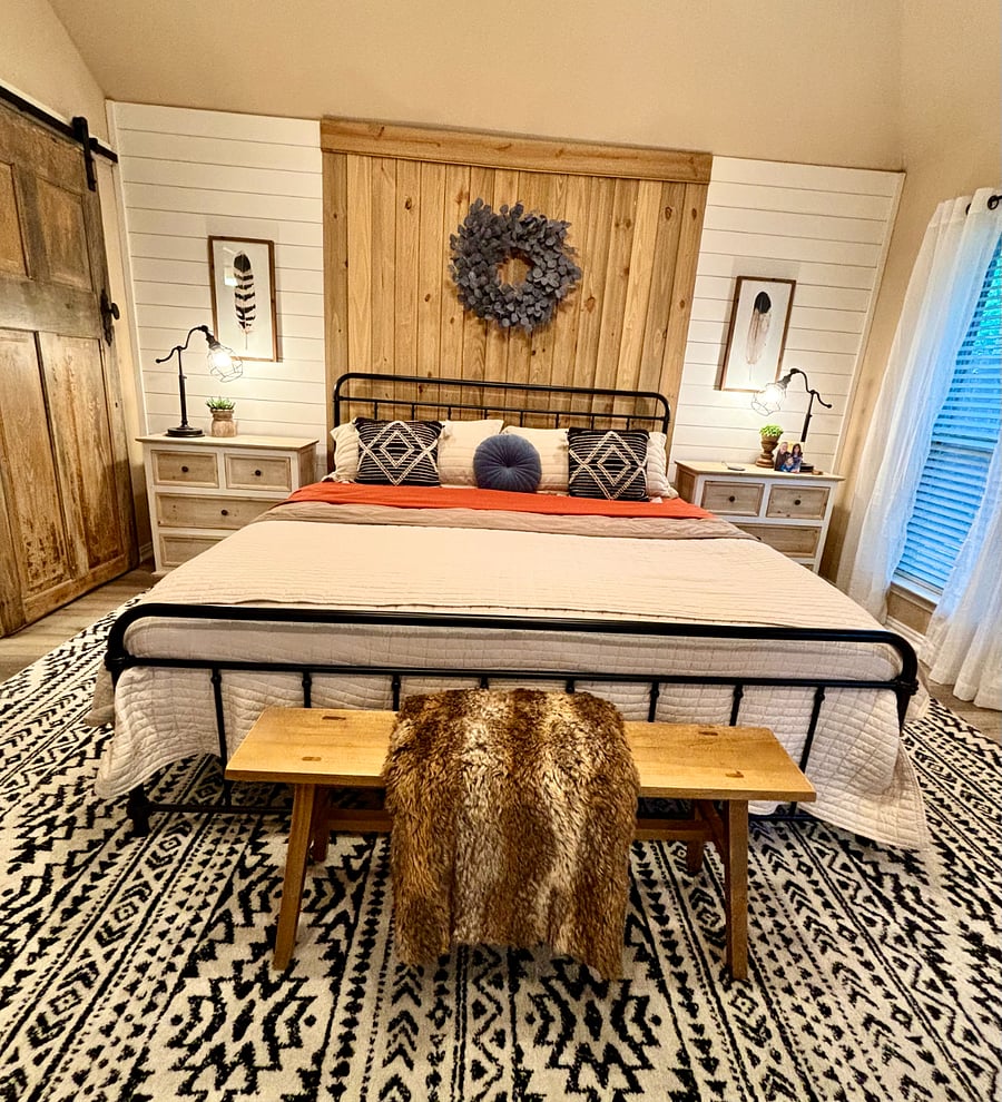 Master bedroom with king bed and dressers