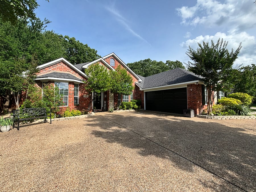 Front view of home with circular drive