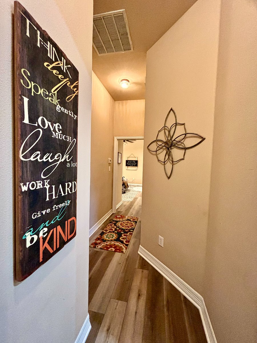 Hallway to master bedroom and bathroom