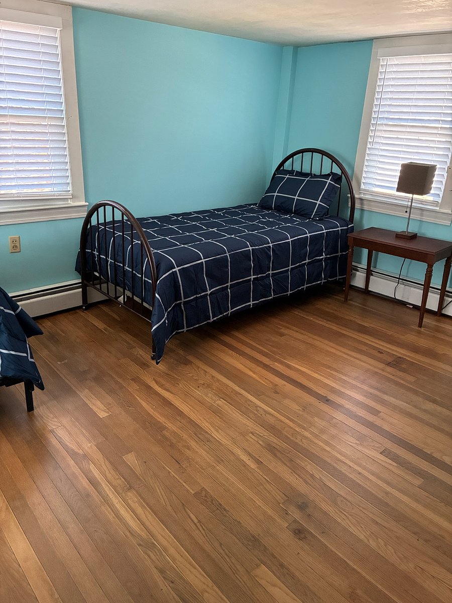2 twin beds with dresser and large closet