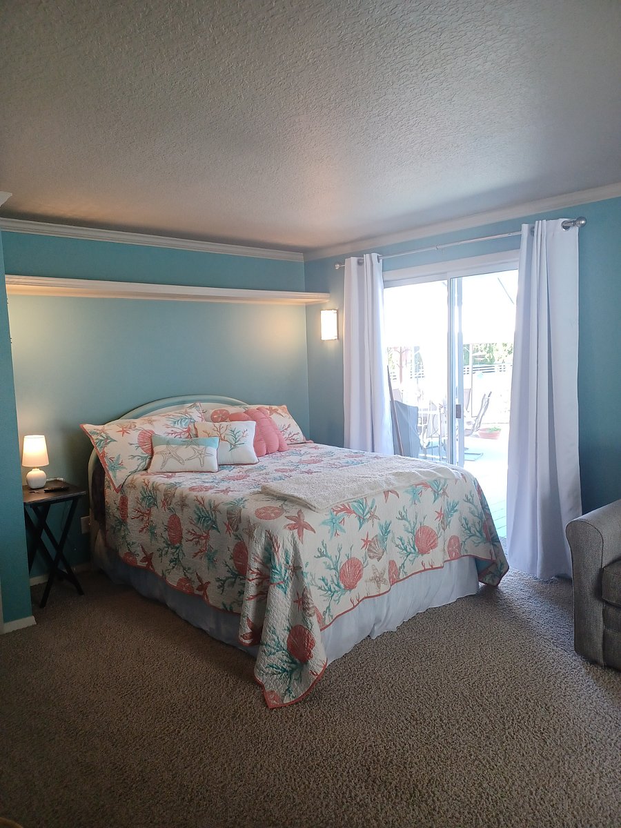 Novaform mattress is firm and comfortable. If preferred, a 2-inch mattress topper is available.
Private entrance to primary suite is through locking sliding glass door.