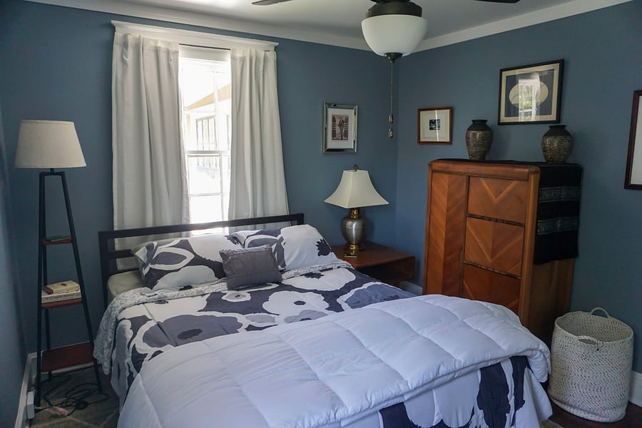 Upstairs corner bedroom: does not have a built-in closet but there is a small space in the "chifforobe" you see here, and there's additional closet space in the adjacent living room.