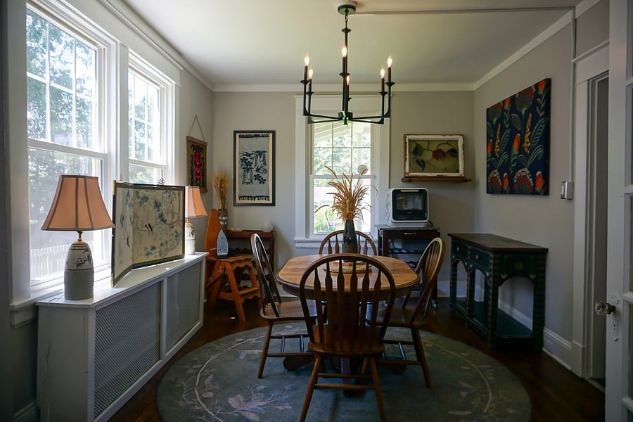 Dining Room: under the stained glass panel on a cart is an apartment-sized dishwasher--you may keep it anywhere that's convenient for you.