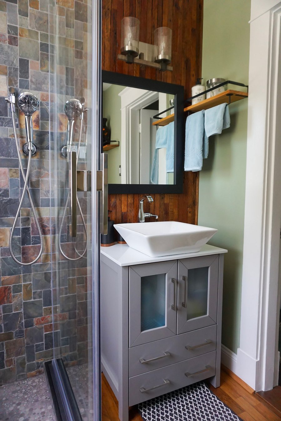 Upstairs bathroom: the back wall is covered with upcycled lath from plaster walls that were removed.