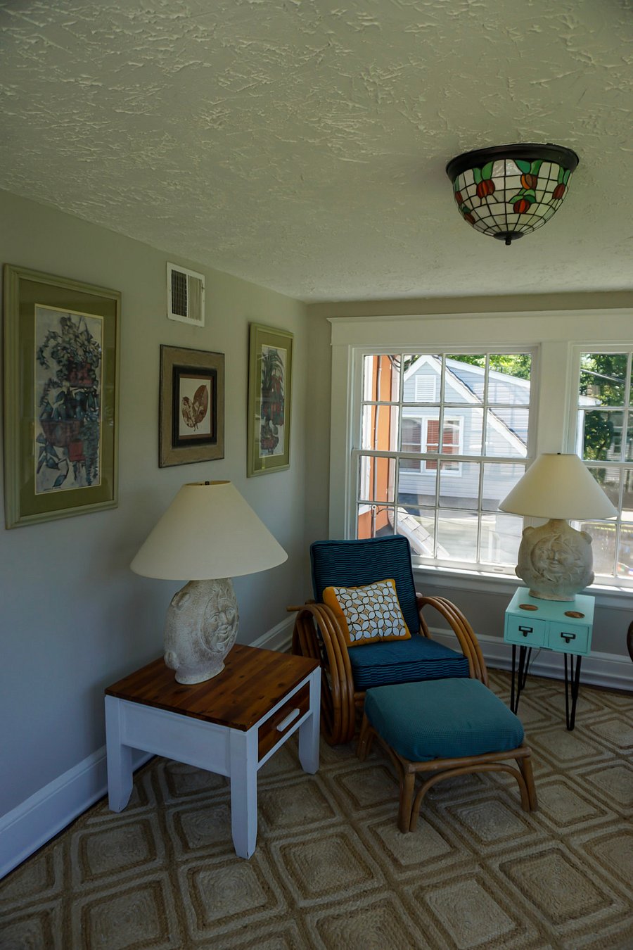 Upstairs sun porch: a comfy spot for coffee or to watch the sunset, plenty of room for a yoga mat.