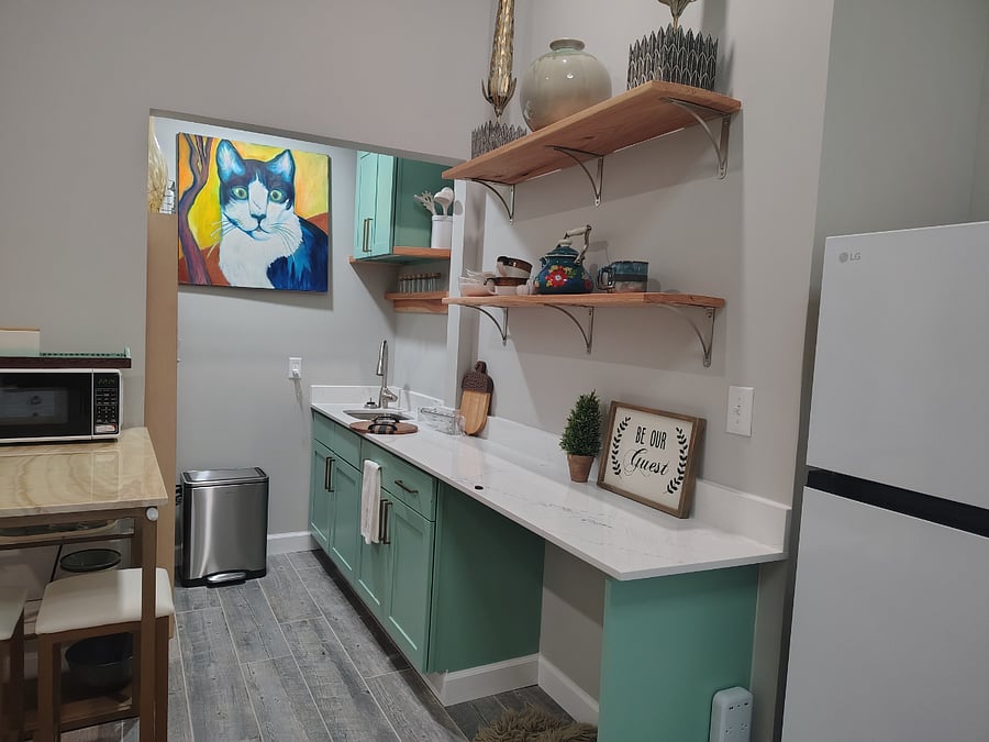 Has an induction stove and small oven. Has microwave and coffee maker. In case you need anything else please request.