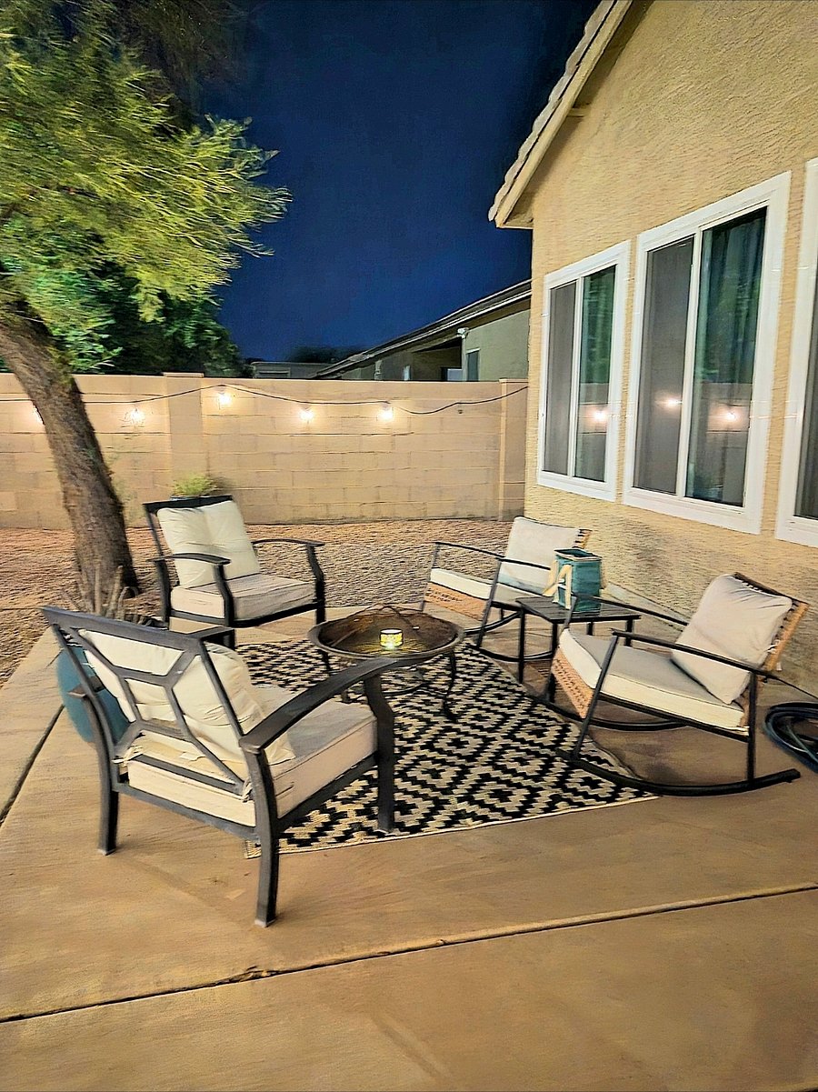 Another view of the backyard patio seating. The windows are brand new in the bedrooms.