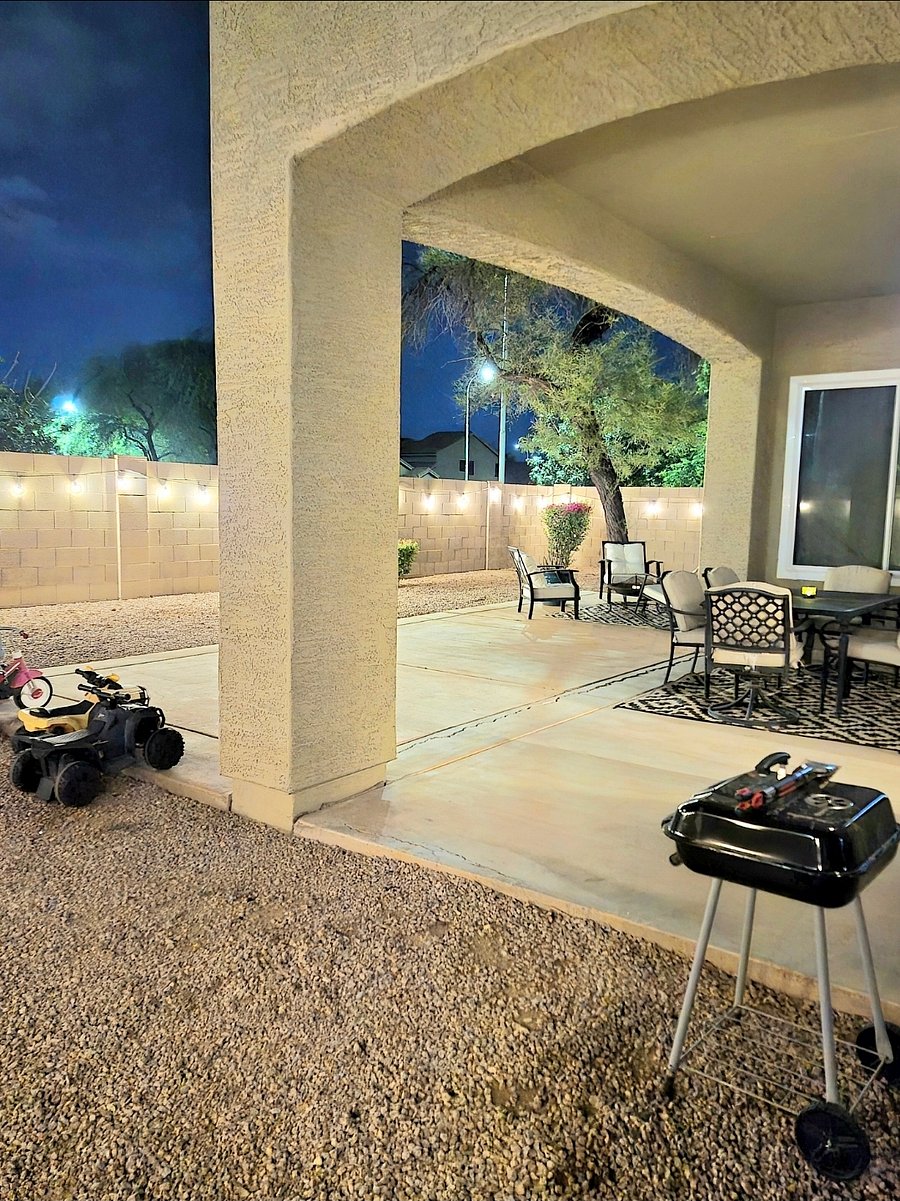Backyard view, small charcoal grill available for your convenience.