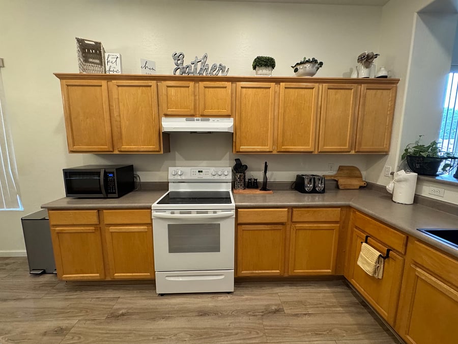 Electric stove/oven, microwave, and all cooking utensils included for your convenience.