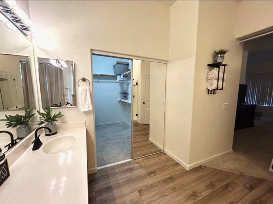 Primary bathroom with roomy walk-in closet.