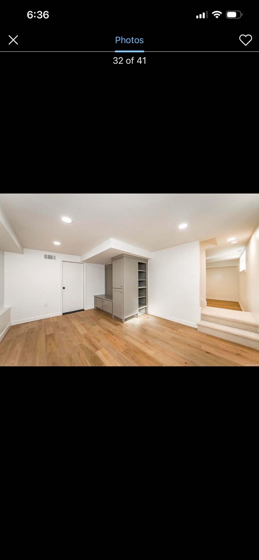 Lower level entrance, mud room. It also has a desk for office space.