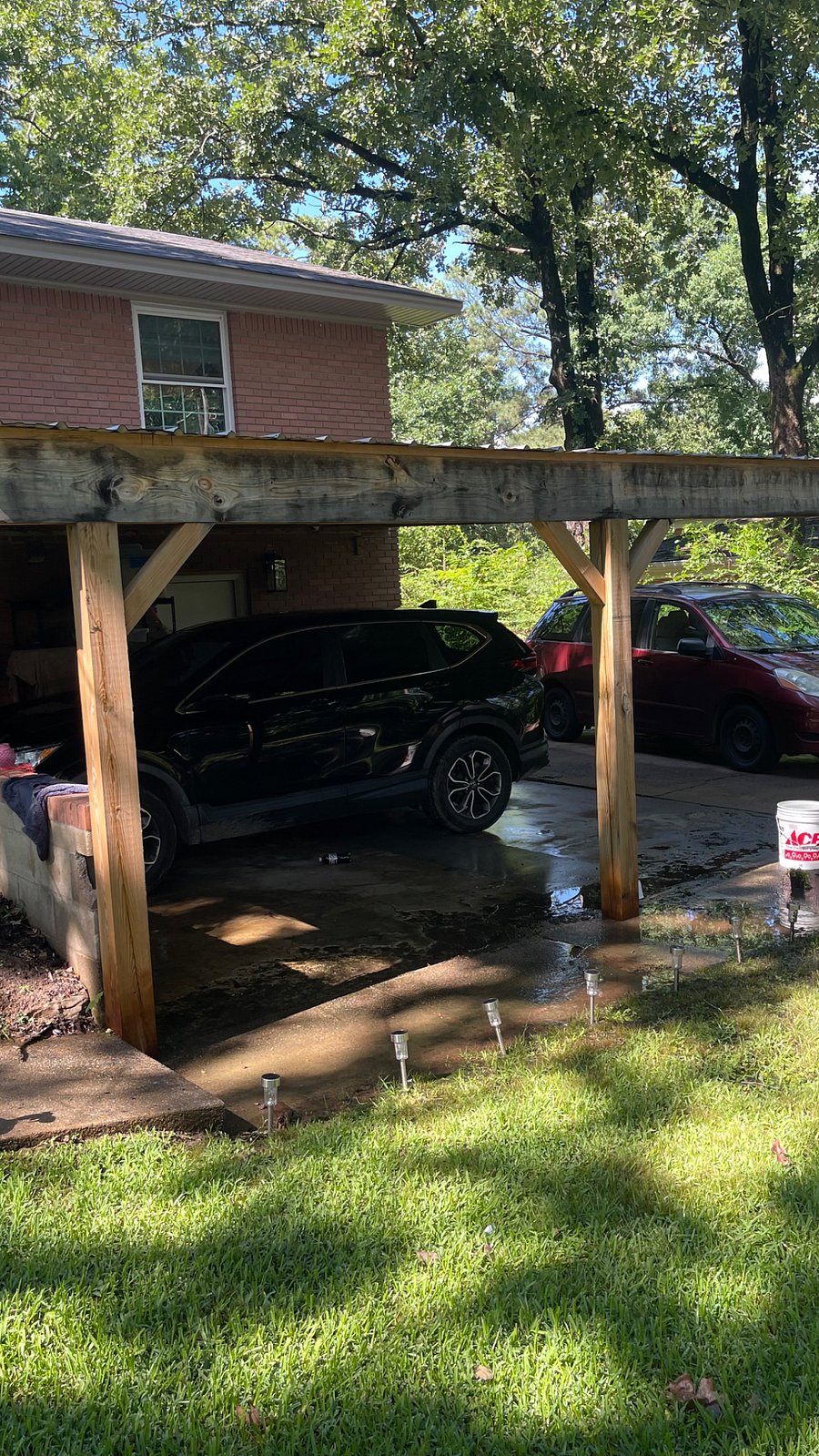 Carport. I hang my bikes here. Very secure. Cameras to see back door.