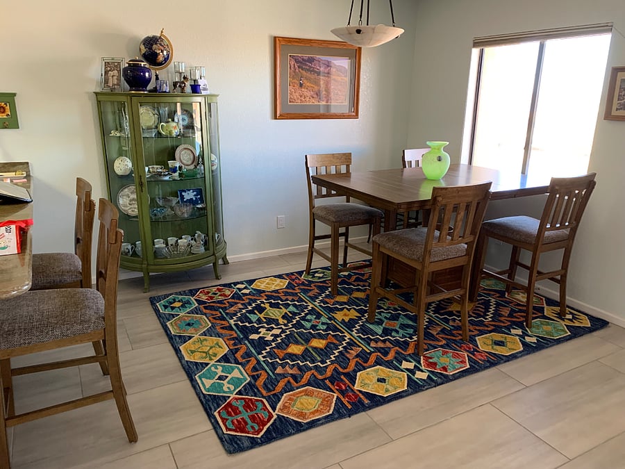 dining area with 6 stools