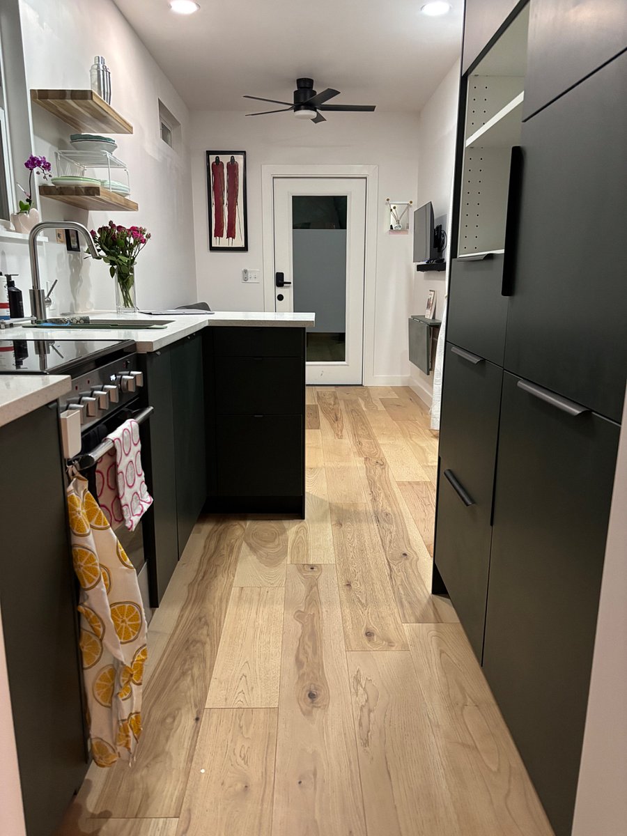 Full kitchen with built in refrigerator.
