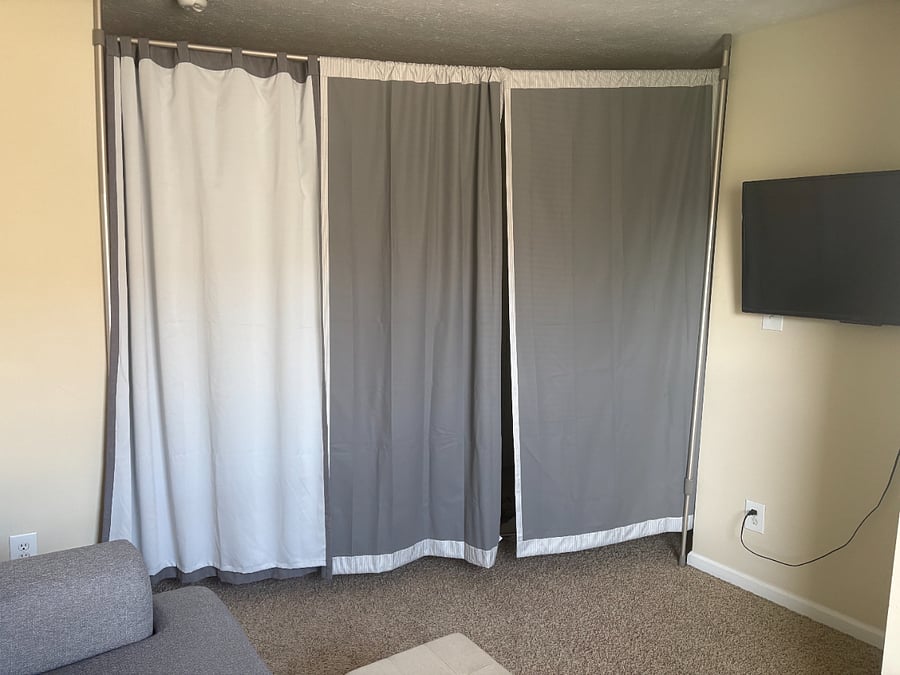 Floor-to-ceiling curtains separate your section of the home from the rest of the home, ensuring privacy.