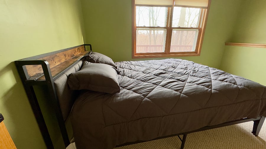Queen size bed on a brand new high quality mattress. Ceiling fan and dimmable lighting in room.