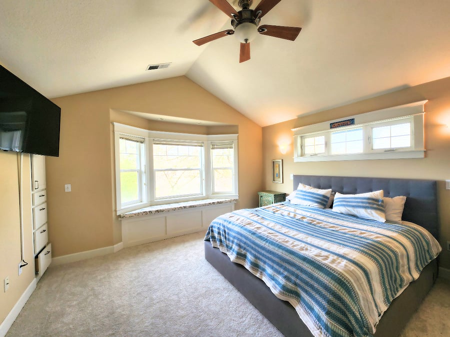Primary (Master) Bedroom
Serene and spacious primary suite with a king bed, elegant bay window seat, and abundant natural light..