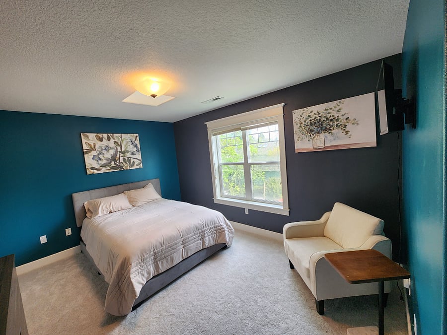Bedroom 2
Bright and inviting bedroom with a queen bed, skylight, and abundant natural light.