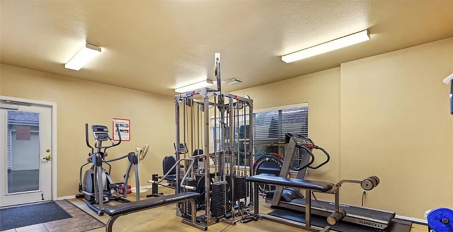 The club house for the complex has a gathering area, gym, and sauna.